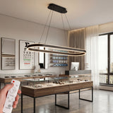 Luminaria de suspensión ovalada negra con luz LED perimetral para hogar.