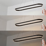 Demostración de control de brillo (dimmer) en luminaria LED moderna para interiores.