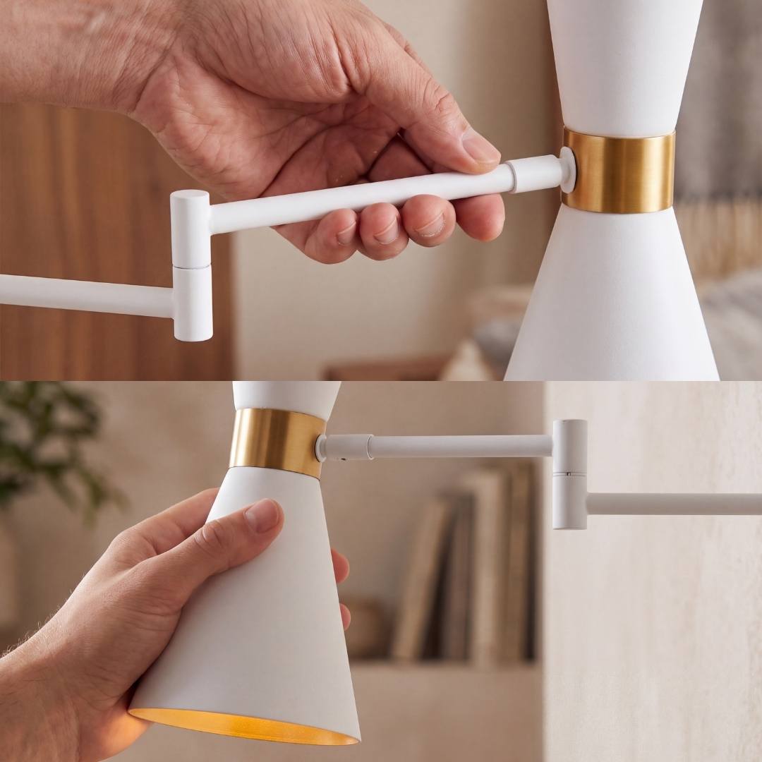 Mano ajustando el brazo extensible del aplique de pared blanco y dorado