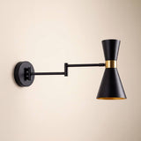 Aplique de pared CAPRI BLACK GOLD con el brazo articulable plegado contra la pared