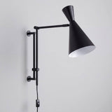Aplique de pared articulable IRIS negro mate sobre fondo blanco