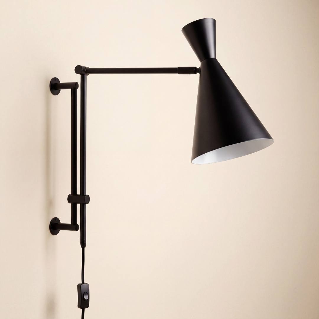 Aplique de pared IRIS negro mate con brazo extendido, vista frontal