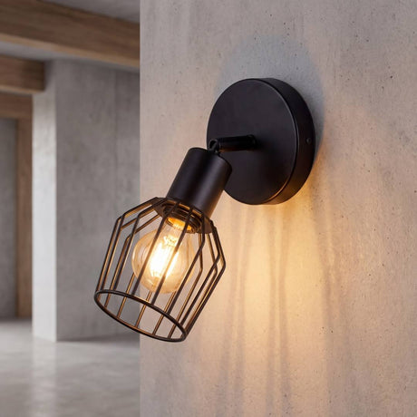 Aplique de pared jaula negro NINA encendido con foco vintage de luz cálida