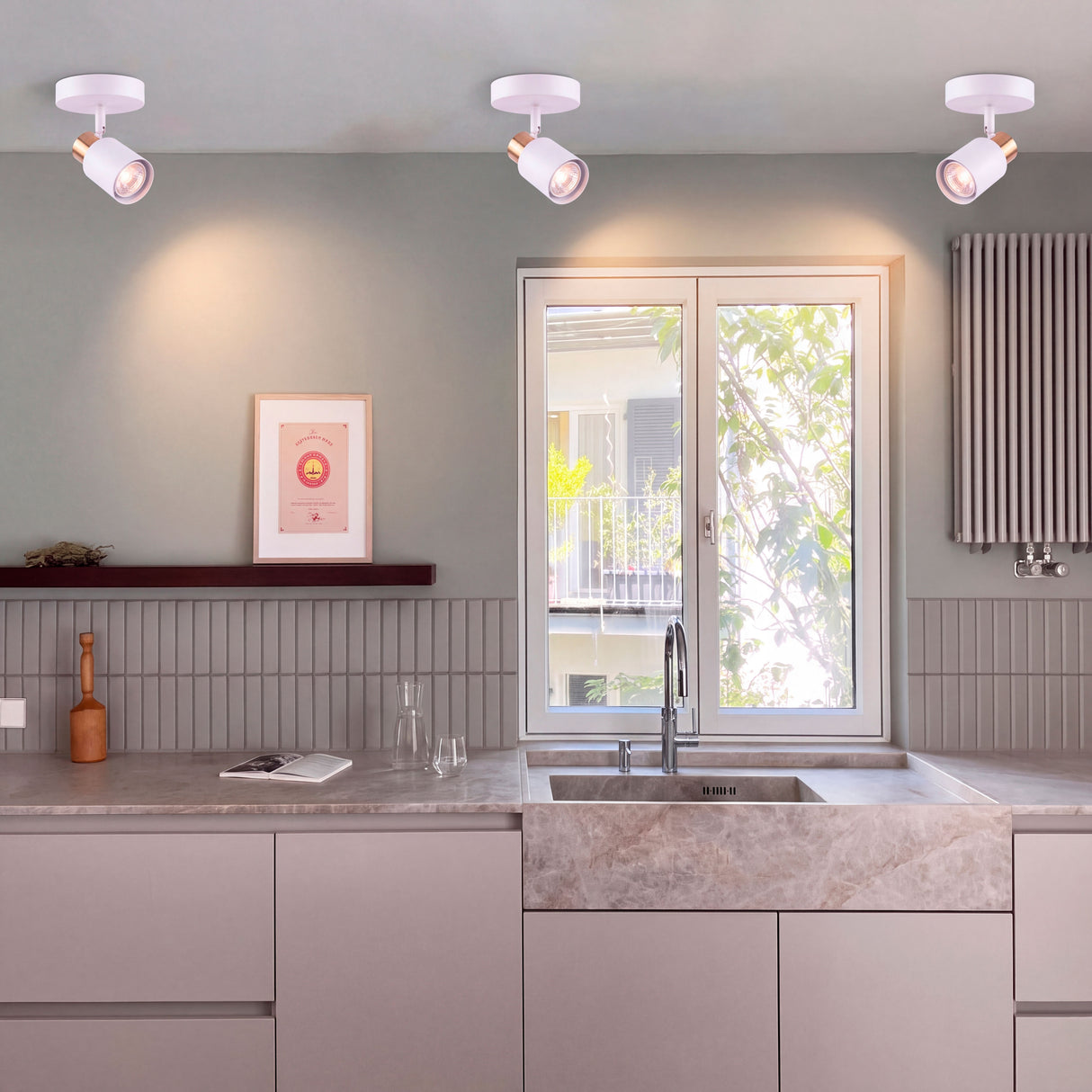 Distribución cenital de puntos de luz de sobreponer en cocina amplia de arquitectura contemporánea.