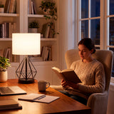 Proyección de luz difusa para zona de lectura que favorece el confort óptico en interiores modernos.