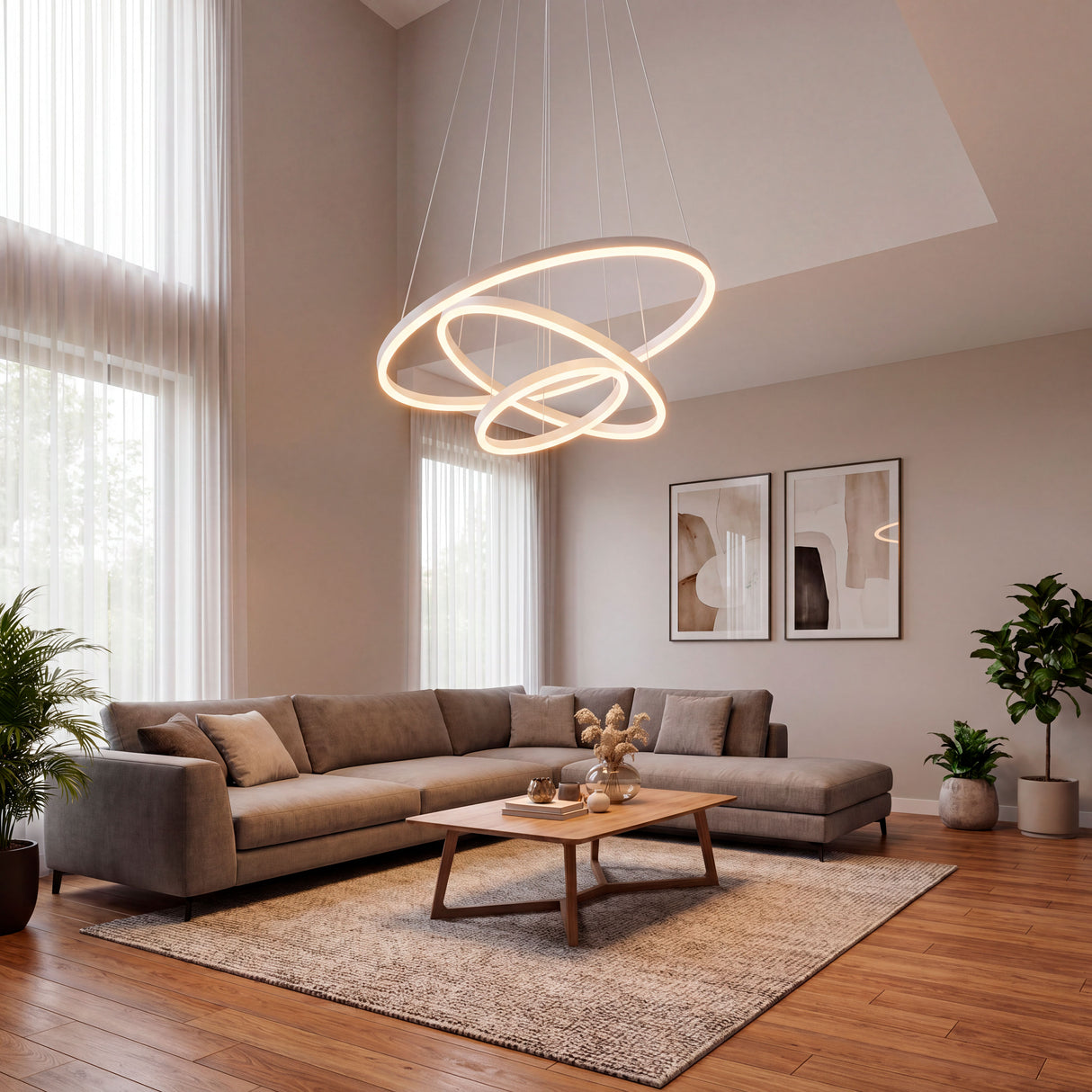 Lámpara de diseño suspendida en un salón de doble altura que complementa la entrada de luz natural.