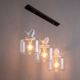 Aplicación decorativa de canopla rectangular con tres lámparas de cristal y luz cálida.