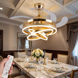 Mesa de comedor formal iluminada por los círculos de luz LED del ventilador Gold.