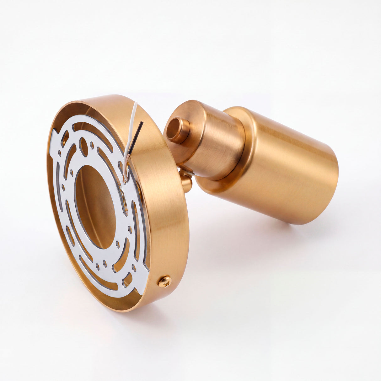 Detalle del soporte circular de anclaje metálico en acabado dorado para fijación limpia en cielo raso.