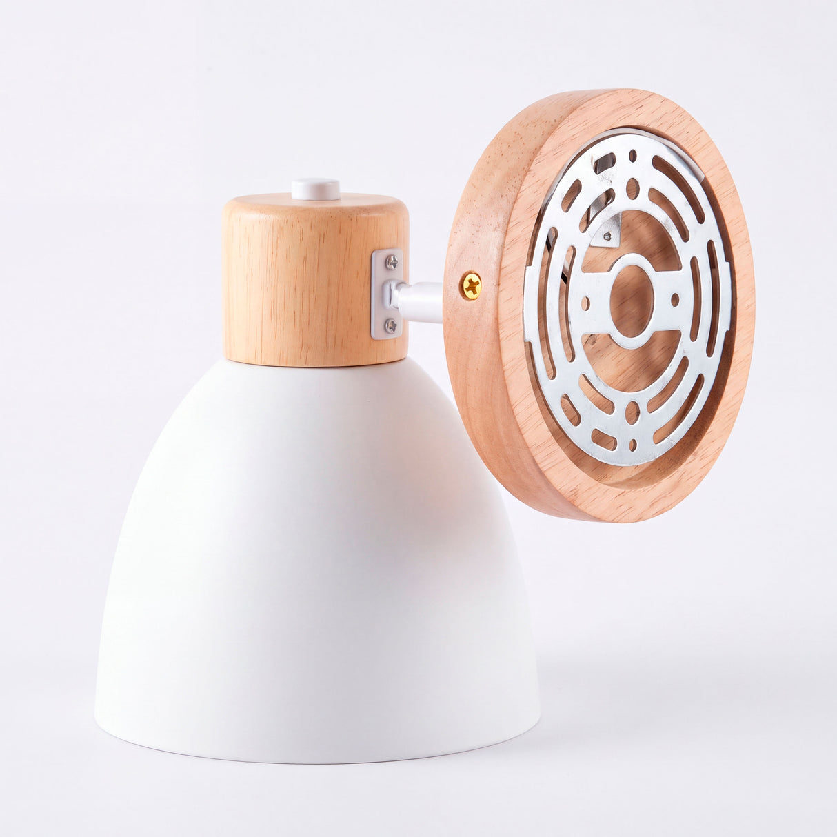 Detalle del platillo de soporte metálico integrado en base circular de madera para anclaje en muro.