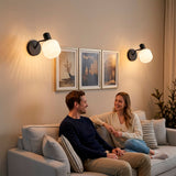 Distribución de luz ambiental tenue sobre zona de estar en proyectos de interiorismo contemporáneo.