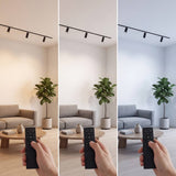 Control remoto cambiando spots magnéticos entre luz cálida, neutra y fría