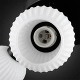 Vista cóncava interior de tulipa de vidrio mate con casquillo técnico para óptima reflexión.
