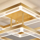 Primer plano de los acabados metálicos dorados y paneles LED de la lámpara de techo moderna.