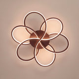 Estructura concéntrica de sobreponer en acabado café mate para iluminación técnica decorativa.