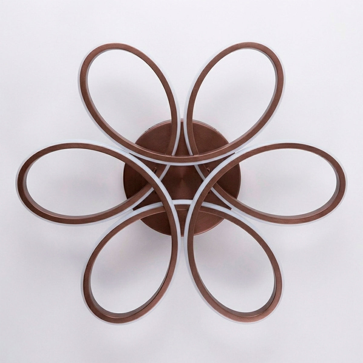 Estructura concéntrica de sobreponer en acabado café mate para iluminación técnica decorativa.
