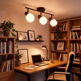 Punto de luz focal direccionable para área de lectura o trabajo que favorece la ergonometría.