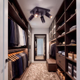 Haz luminoso cenital de alta fidelidad cromática proyectado en closet vestidor residencial.