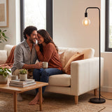 Atmósfera acogedora en salón contemporáneo creada mediante luz puntual y diseño minimalista.