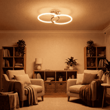Configuración de luz para zonas de espera con mobiliario de diseño y tonos tierra.