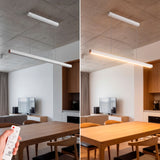 Lámpara Marsella White en sala de estar minimalista con mobiliario de madera clara.