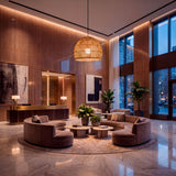 Diseño de iluminación para lobbies de hoteles con estética eco-luxury y techos altos.