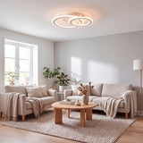 Iluminación cenital sobre salón moderno para crear ambientes cálidos y de alto confort óptico.