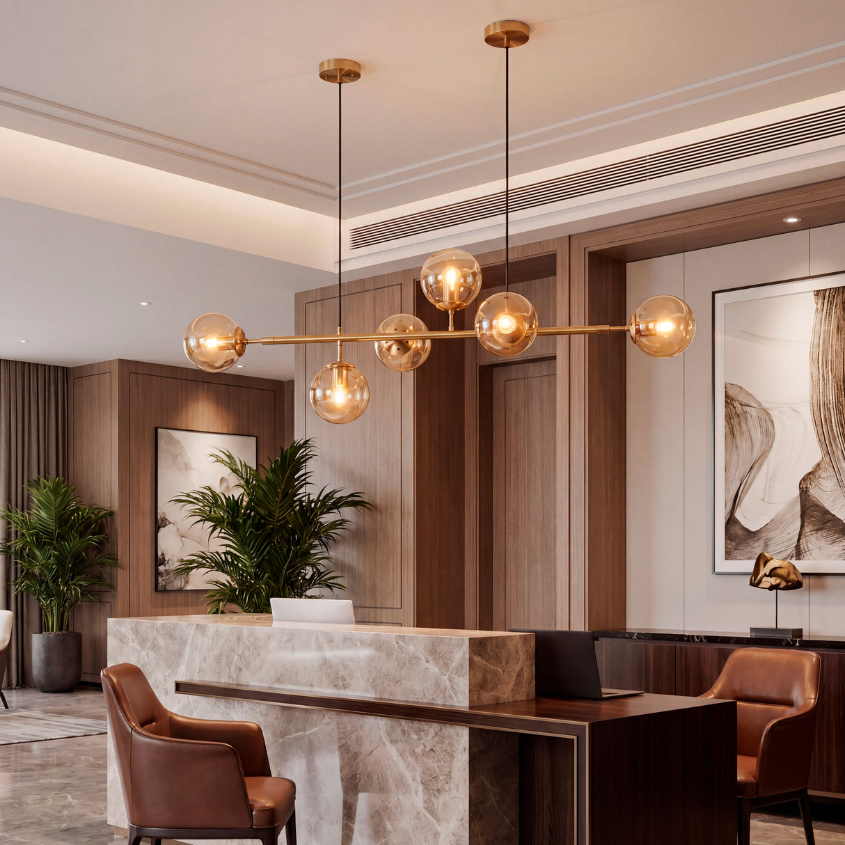 Lámpara horizontal de esferas iluminando la mesa de recepción de un edificio corporativo o spa.