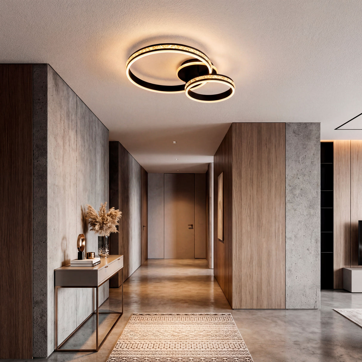 Lámpara de diseño en entrada de casa con muebles de madera y tonos neutros.