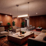 Amplio salón de diseño con paredes de madera iluminado de forma homogénea por el aplique LED.