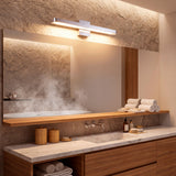 Ambiente de baño con vapor iluminado por el resplandor cálido de la Josefina Silver.