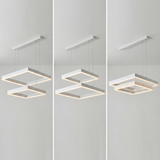 Ejemplo de decoración con tres lámparas cuadradas blancas en un mismo ambiente