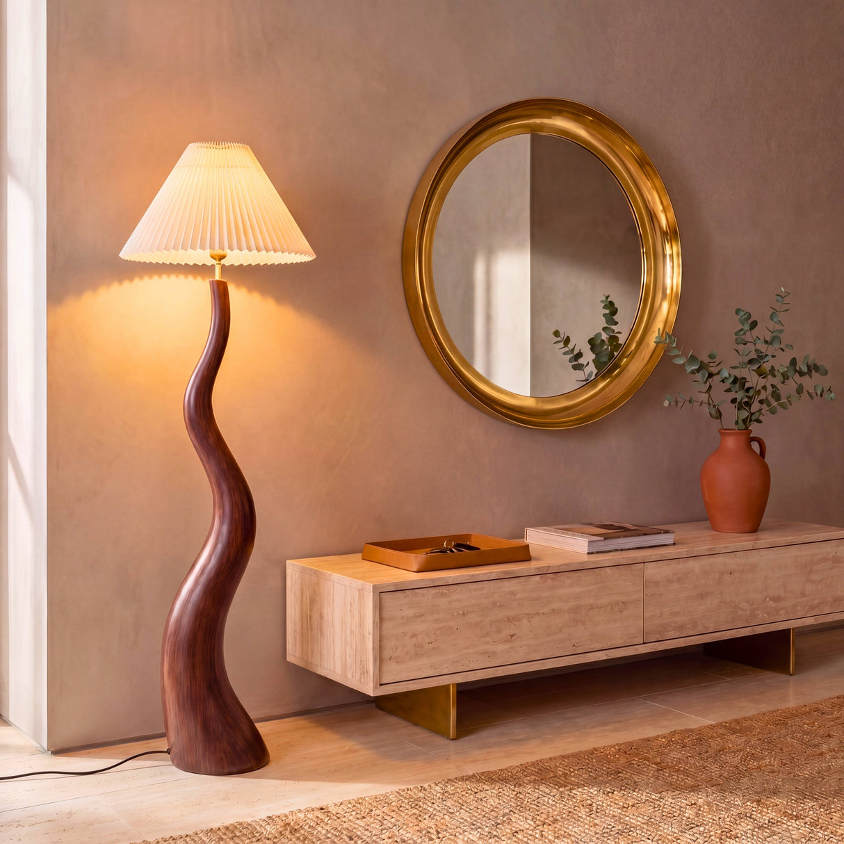 Interiorismo de recibidor sofisticado con iluminación cálida de apoyo y mobiliario de madera.