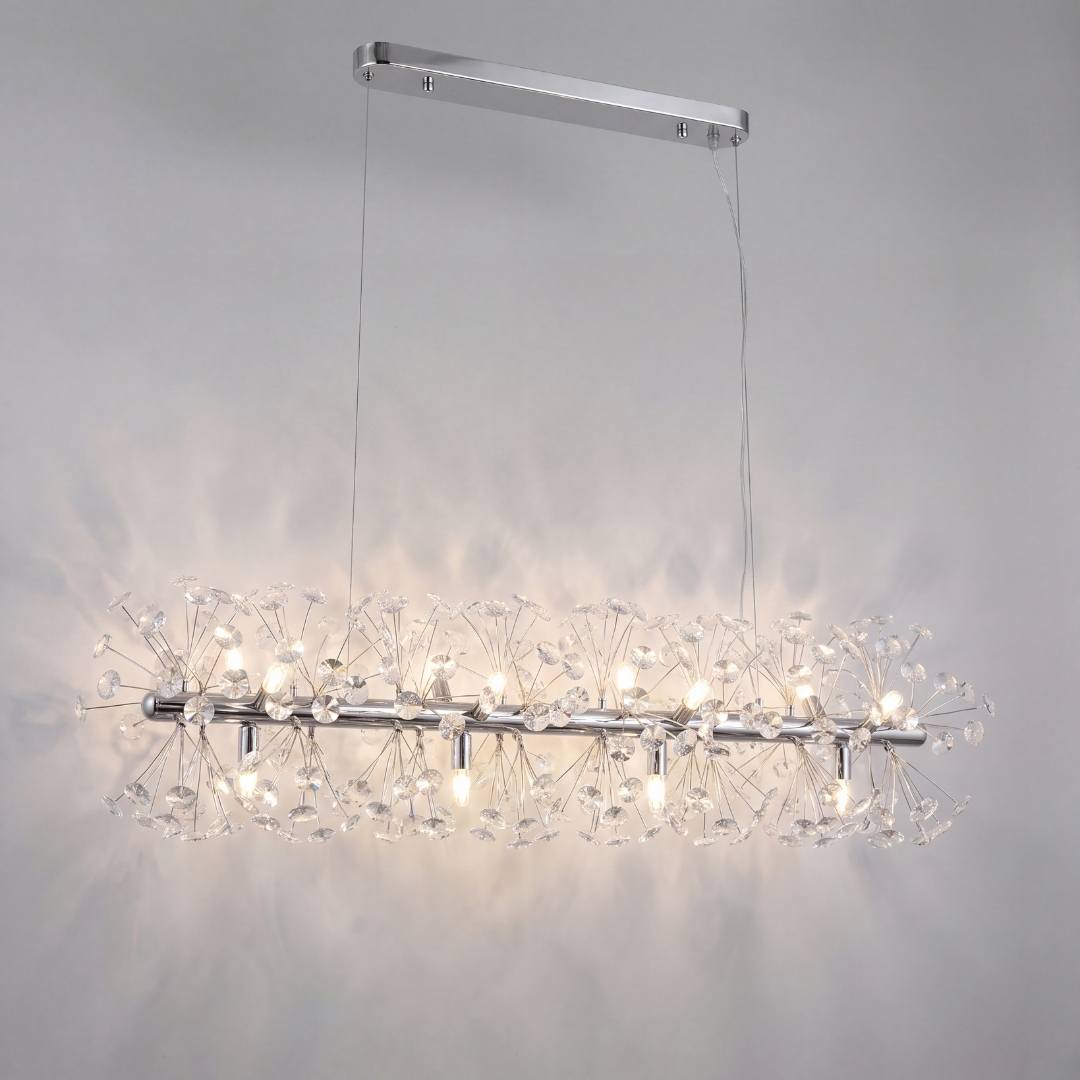 Lámpara colgante MESSIE encendida con 12 luces G9 y destellos de cristal