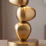 Detalle de las piedras doradas apiladas de la lámpara PIETRA GOLD