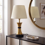 Lámpara decorativa COCO GOLD AND BLACK en consola de madera con espejo redondo