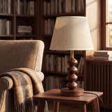 Lámpara decorativa GRETA de estilo retro junto a estantería con libros