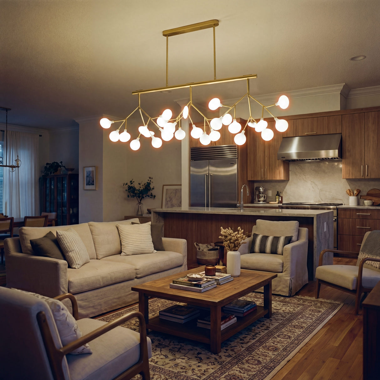 Iluminacion calida para sala y cocina integrada en departamento contemporaneo.