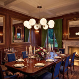 Lampara de techo para comedor formal con mesa larga y decoracion de lujo