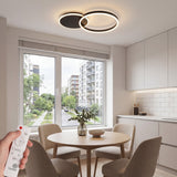 Lámpara de techo circular para comedor diario con iluminación perimetral.