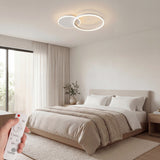 Iluminación LED para dormitorio principal con diseño de círculos entrelazados en color blanco.