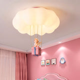 Vista nocturna de dormitorio iluminado por el suave resplandor de la nube Little Angel.
