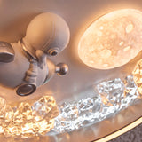 Vista detallada de los acabados artísticos en relieve con difusor esférico de luz cálida integrada.
