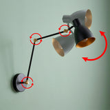 Ilustración vectorial del sistema de rotación doble y articulaciones orientables para control de luz.