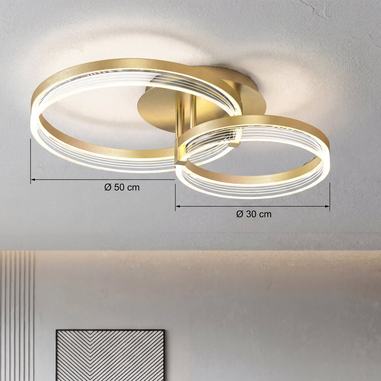 Infografía con las dimensiones de los aros de 30 cm y 50 cm del plafón LED circular doble.