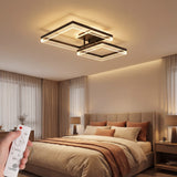 Luminaria de techo cuadrada integrada en dormitorio moderno con iluminación indirecta acogedora.