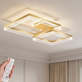 Plafón de techo LED con dos marcos cuadrados dorados cruzados para decoración de interiores.
