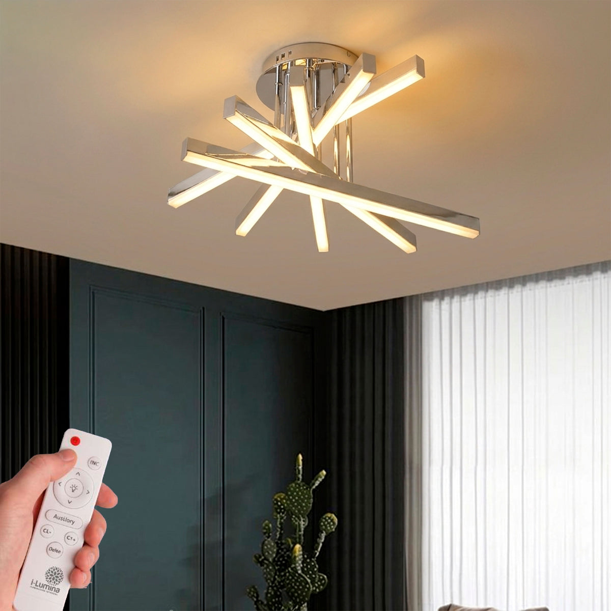 Plafón de techo con barras lineales cruzadas en acabado cromo para iluminación técnica de interiores.