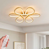 Plafón de techo con diseño orgánico en arcos entrelazados para iluminación técnica de interiores modernos.