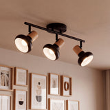 Plafón de tres focos orientables en negro mate y madera natural para proyectos de iluminación técnica.